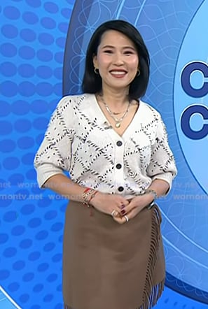 Vicky's white stitched cardigan and fringed wrap skirt on Today