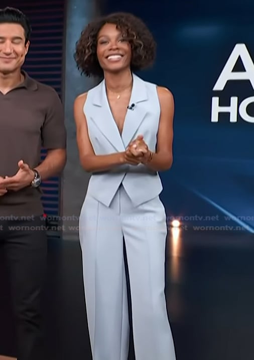 Zuri's blue vest and pants on Access Hollywood