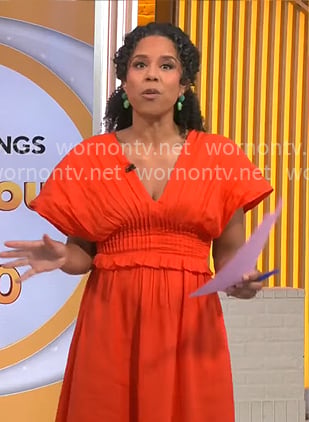 Adriana Diaz's orange v-neck smocked waist dress on CBS Mornings