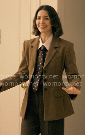 AJ's brown tie-neck blouse and olive blazer on Not Suitable For Work