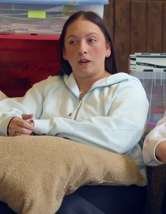Alli's light blue hoodie on The McBee Dynasty Real American Cowboys