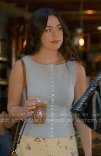 Annie's blue sleeveless top and yellow floral mini skirt on Sweet Magnolias