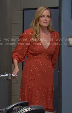 Belle's orange v-neck tiered dress on Days of our Lives