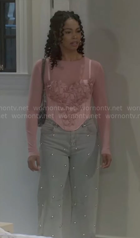 Chelsea's pink floral applique corset top and studded jeans on Beyond the Gates