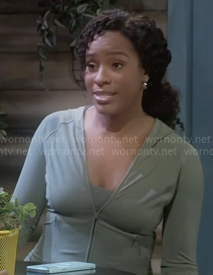 Naomi's green active jacket on Beyond the Gates