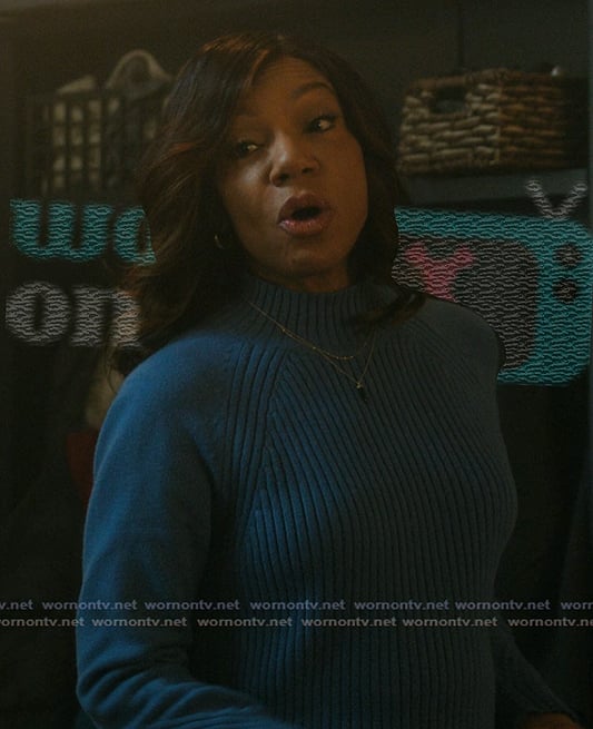 Nina's blue ribbed sweater on The Chi