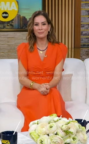 Rebecca Jarvis's orange ruched front dress on Good Morning America