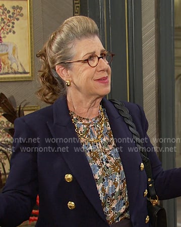 Rita's floral blouse and navy blazer on Days of our Lives