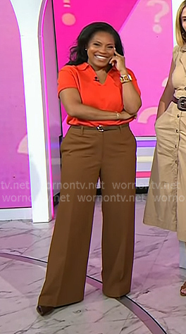 Sheinelle's red polo sweater and brown pants on Today