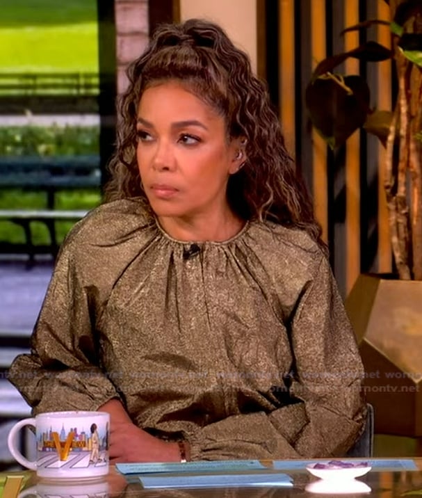 Sunny's metallic jacket and skirt on The View