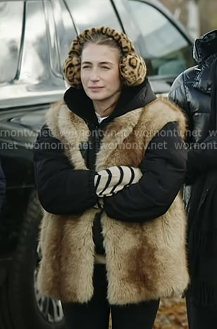 Amanda's beige fur vest and leopard earmuffs on In The City