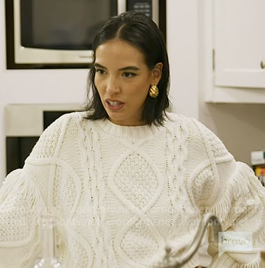 Danielle's white fringed cable knit sweater on In The City