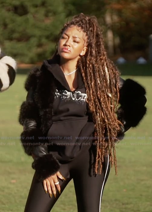 Drew's black shearling stripe jacket on The Real Housewives of Atlanta