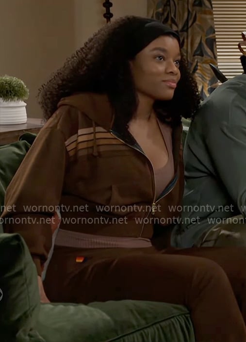 Eva's brown striped hoodie and pants set on Beyond the Gates