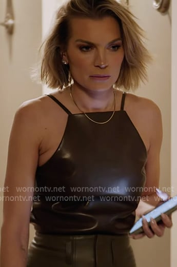 Lindsay's brown leather top on In The City