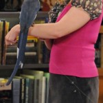 Bernadette’s hot pink vest and black skirt on The Big Bang Theory