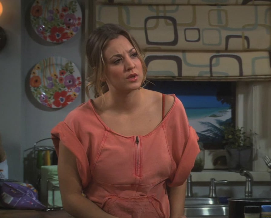 Penny’s orange off shoulder top on The Big Bang Theory