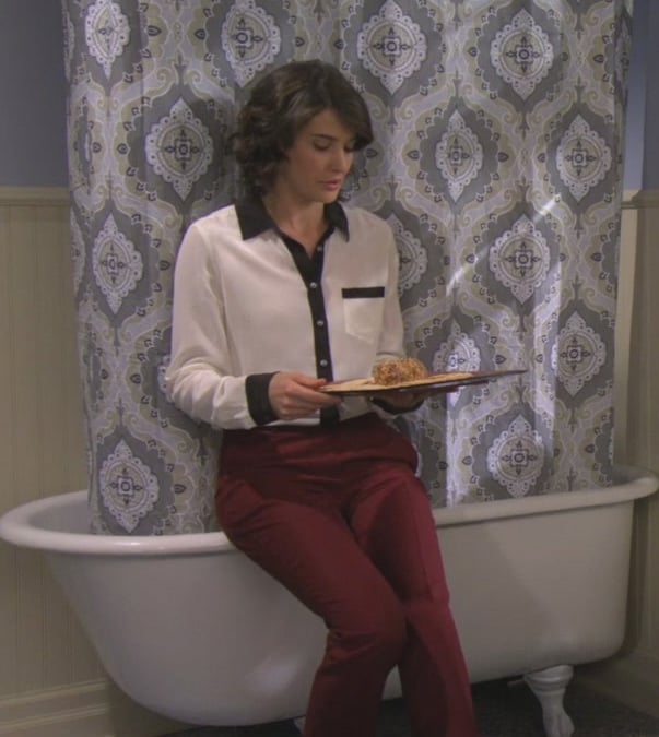 Robin’s black and white button up blouse with red pants from the bathroom scene on How I met your mother