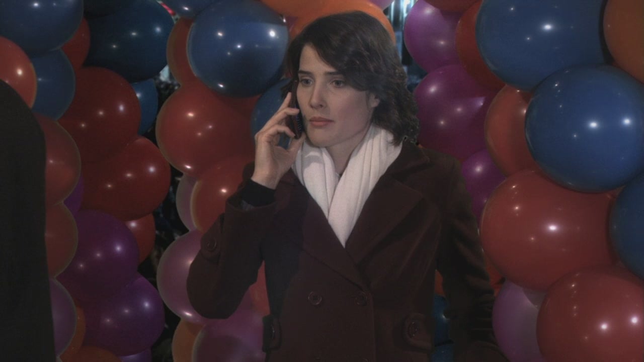 Robin’s burgundy coat with cream scarf on How I met your mother