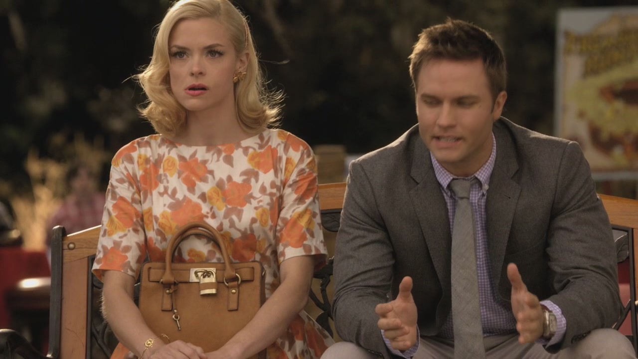 Lemon’s brown lock bag and orange floral dress on Hart of Dixie