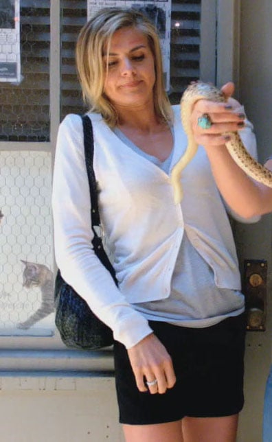 Jane’s white cardi and black mini on Happy Endings