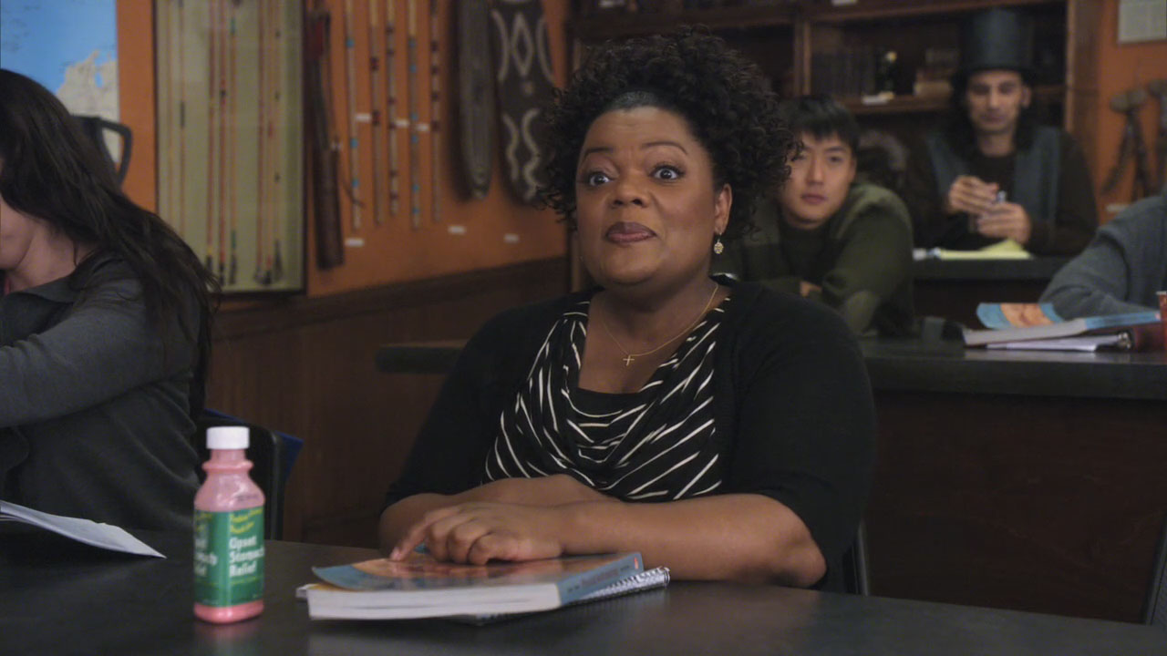 Shirley’s black and white striped cowneck top on Community
