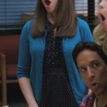 Annie’s teal cardigan over navy patterned dress on Community