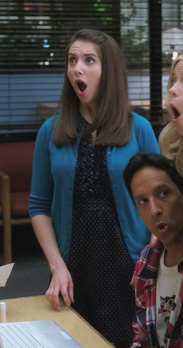Annie’s teal cardigan over navy patterned dress on Community