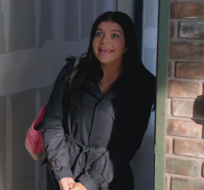 Penny’s black coat and pink handbag on Happy Endings
