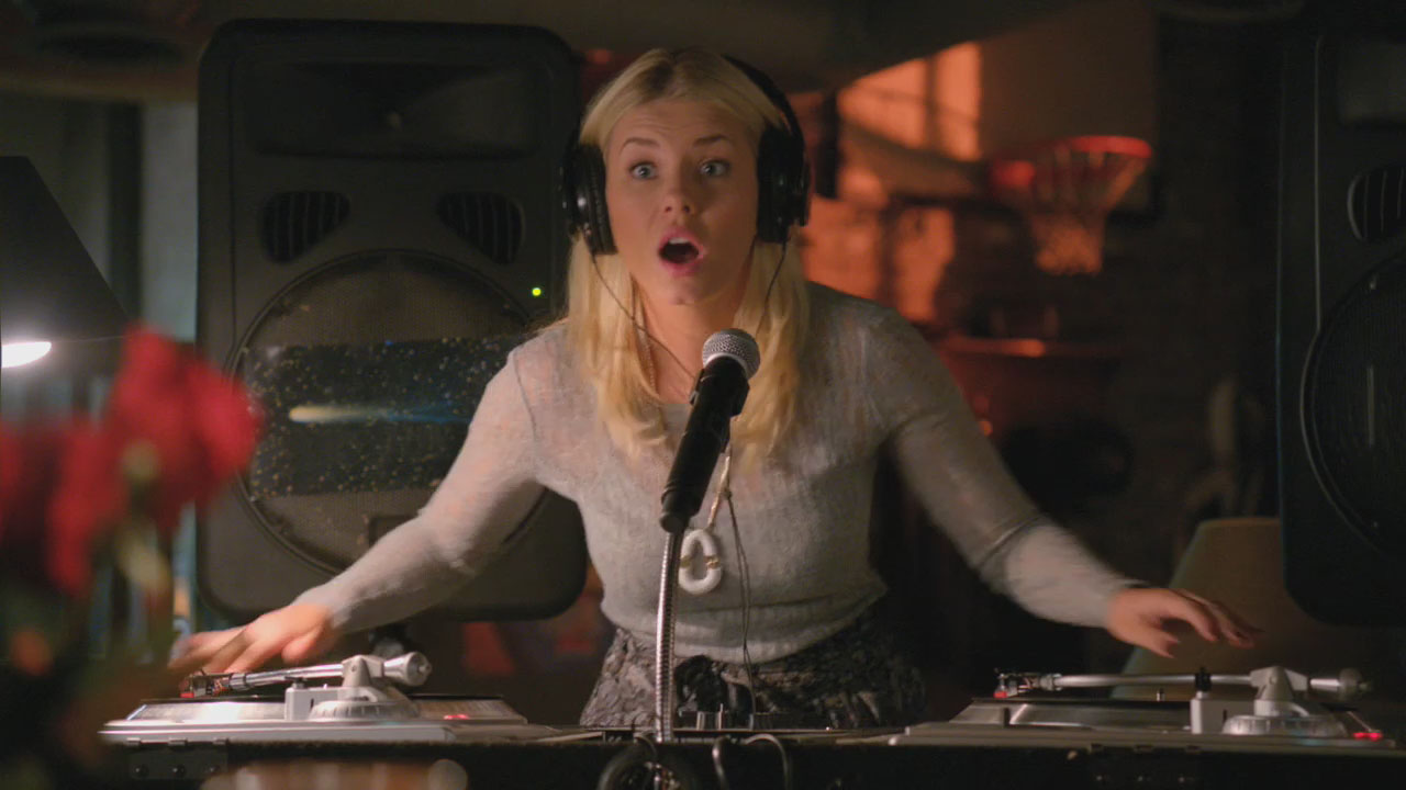 Alex’s light grey sweater and white necklace on Happy Endings