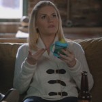 Alex’s white knit cardigan with leather buckles on Happy Endings