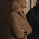 Jane’s beige coat and handbag on Happy Endings