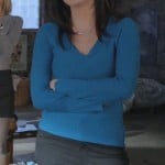 Penny’s blue v-neck sweater on Happy Endings