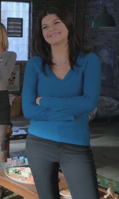 Penny’s blue v-neck sweater on Happy Endings