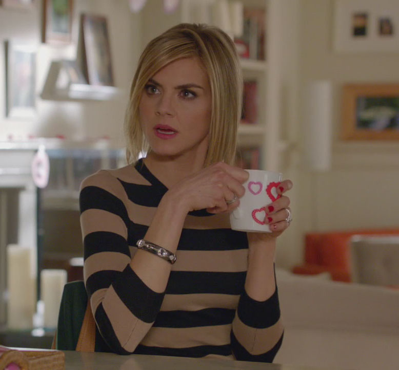 Jane’s tan and black striped sweater on Happy Endings