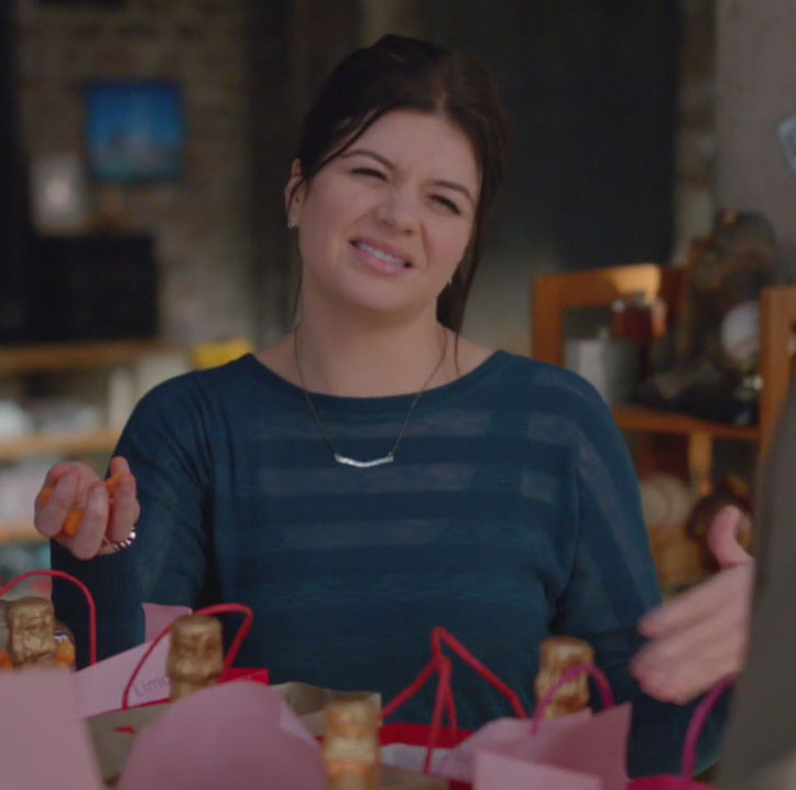 Penny’s teal blue sheer striped top on Happy Endings