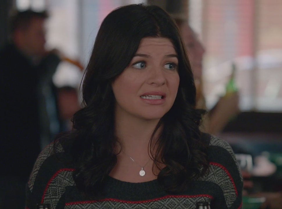 Penny’s grey and red striped sweater on Happy Endings