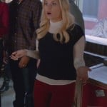 Alex’s red pants with white turtleneck top