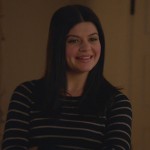 Penny’s black striped sweater on Happy Endings
