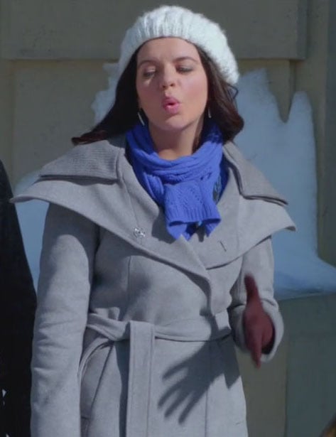 Penny’s grey coat with white knit beanie on Happy Endings