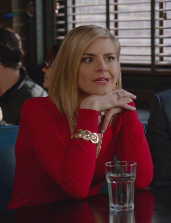 Jane’s red top and gold bracelet on Happy Endings