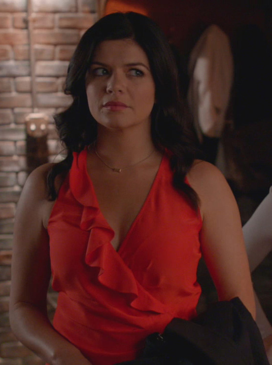 Penny’s red/coral ruffle wrap top on Happy Endings