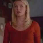 Alex’s orange longsleeve top on Happy Endings