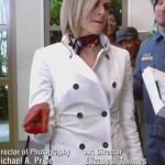 Jane’s white coat with red gloves on Happy Endings