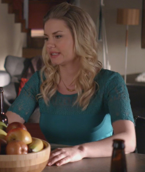 Alex’s teal green lace top on Happy Endings