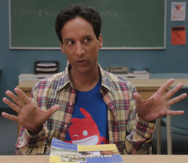 Abed’s blue shirt with red character on it on Community