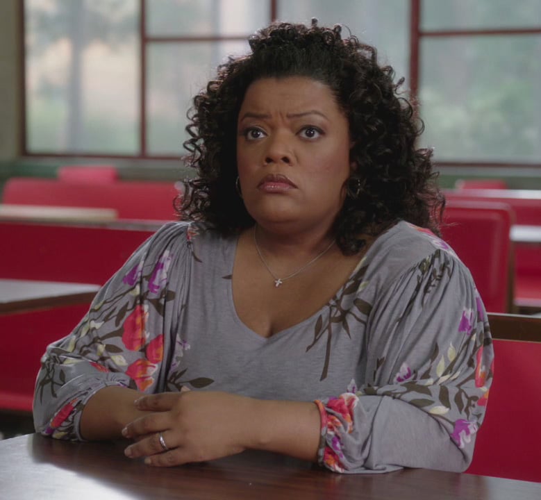 Shirley’s grey top with flowers on Community