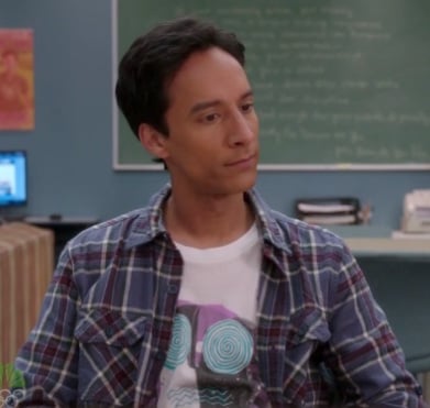 Abed’s white shirt with swirl graphic on Community