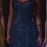 Emily’s blue ruffle gown at the masquerade gala