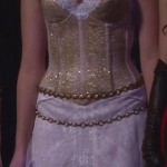 Hanna’s white and gold corset style gown with flower crown on Pretty Little Liars